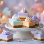Serving pastel Halloween cheesecake bites at a party